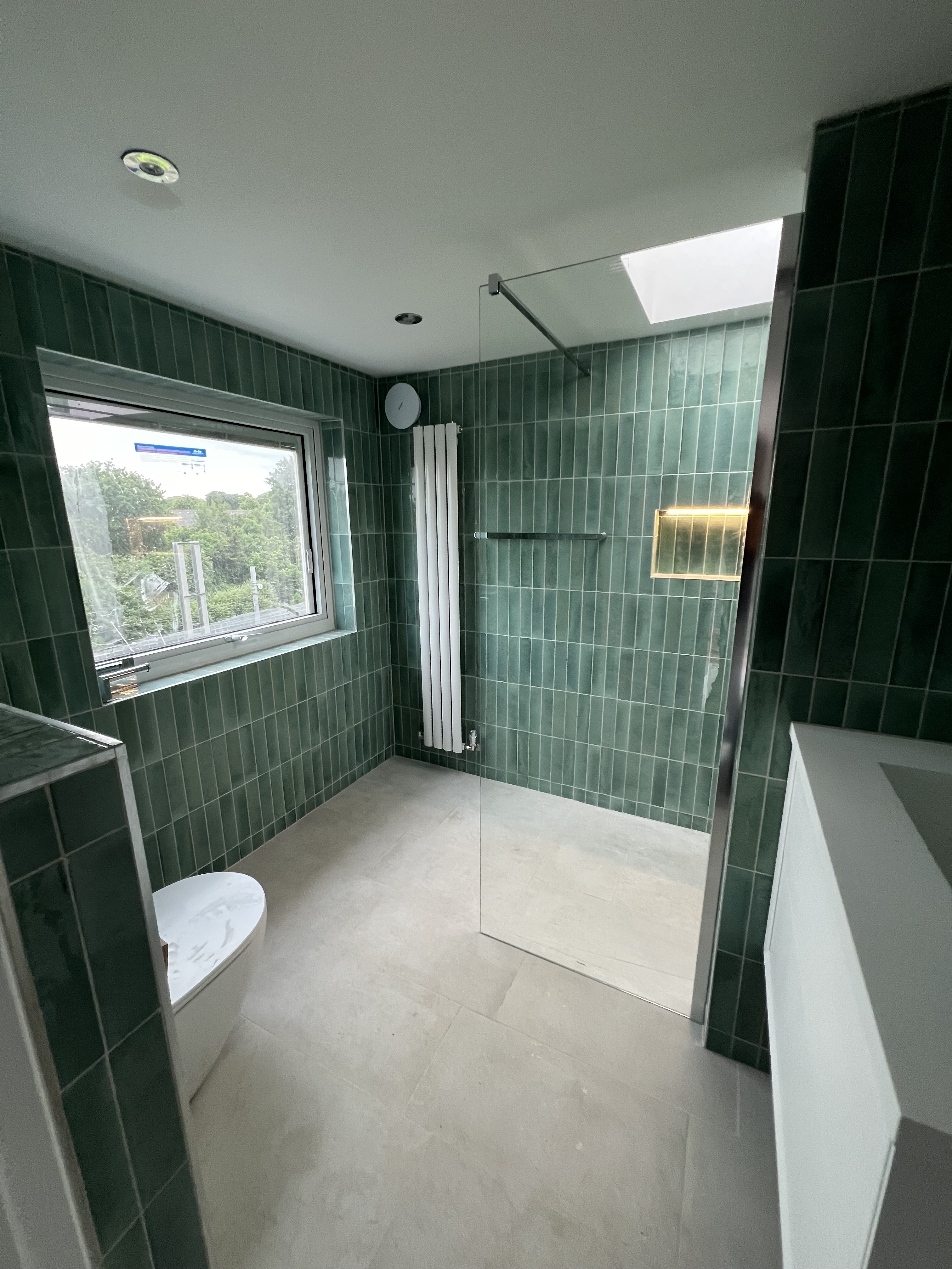 Wetroom with small tiles and Grohe Bathroom Fixtures
